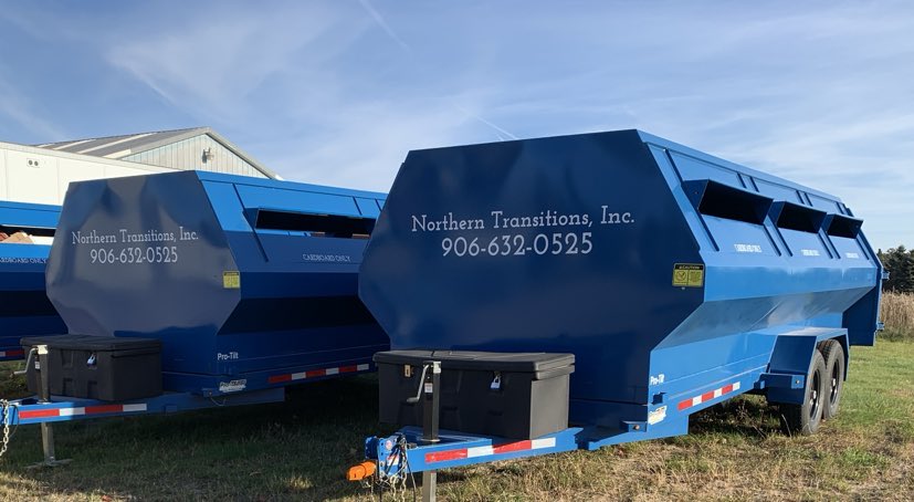 Image is of a blue cardboard only trailer